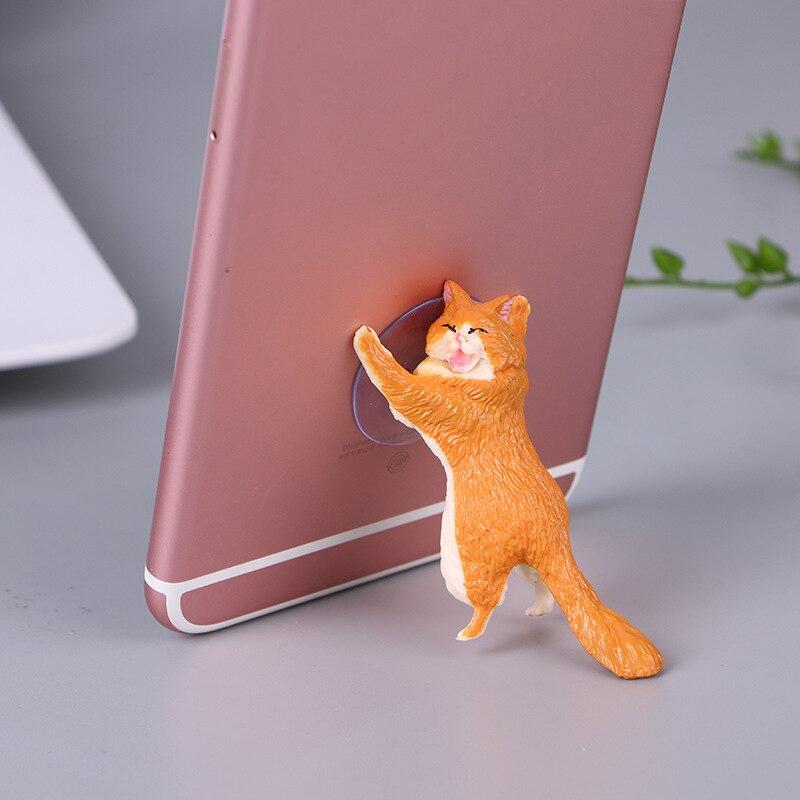 Stojalo za telefon ali tablico v obliki srčkane mačke dom Komot oker 
